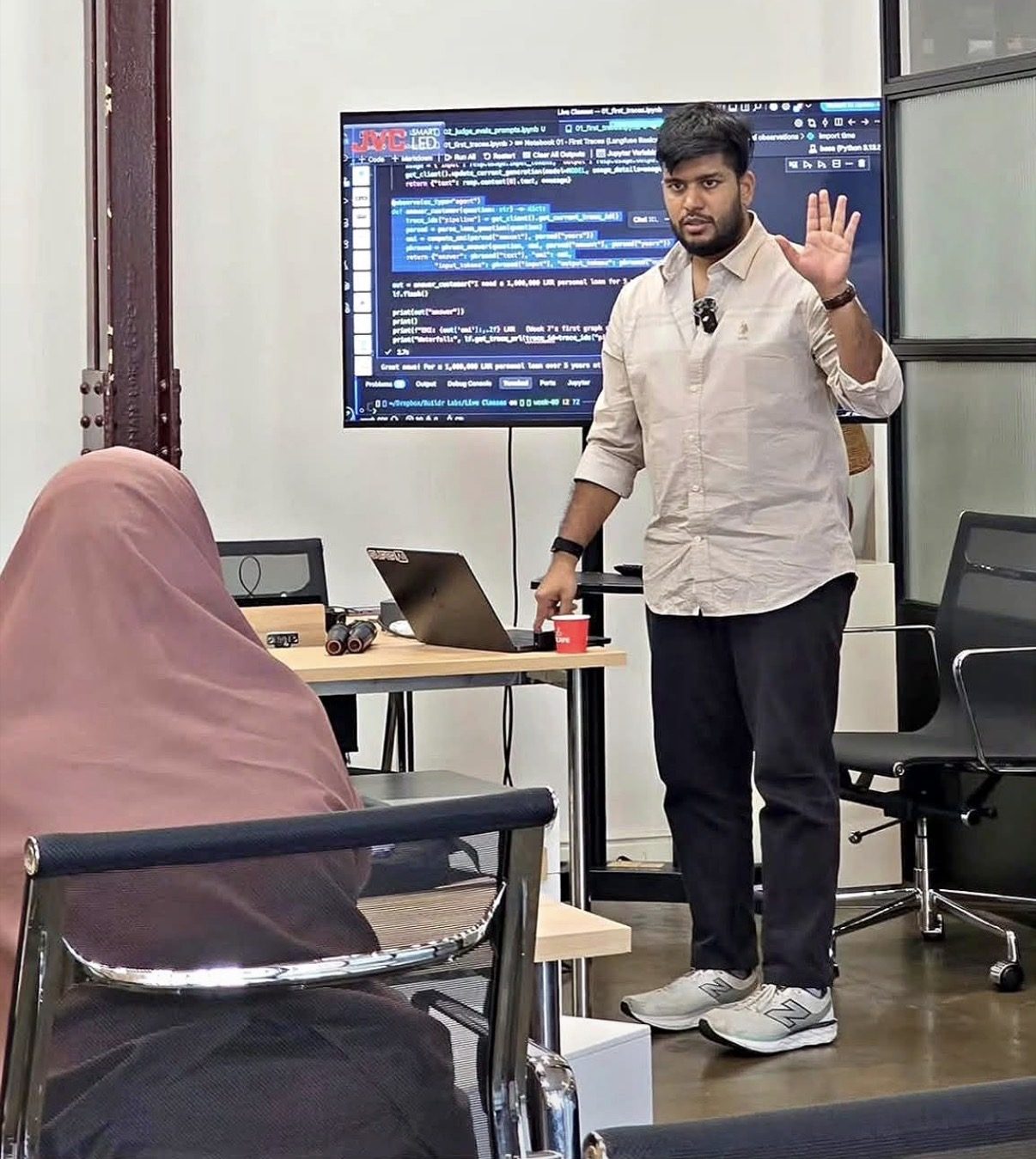 Isuru live-coding an example for a workshop audience