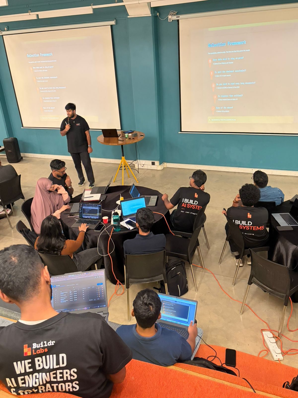 Engineers learning together in a We Build AI Engineers workshop